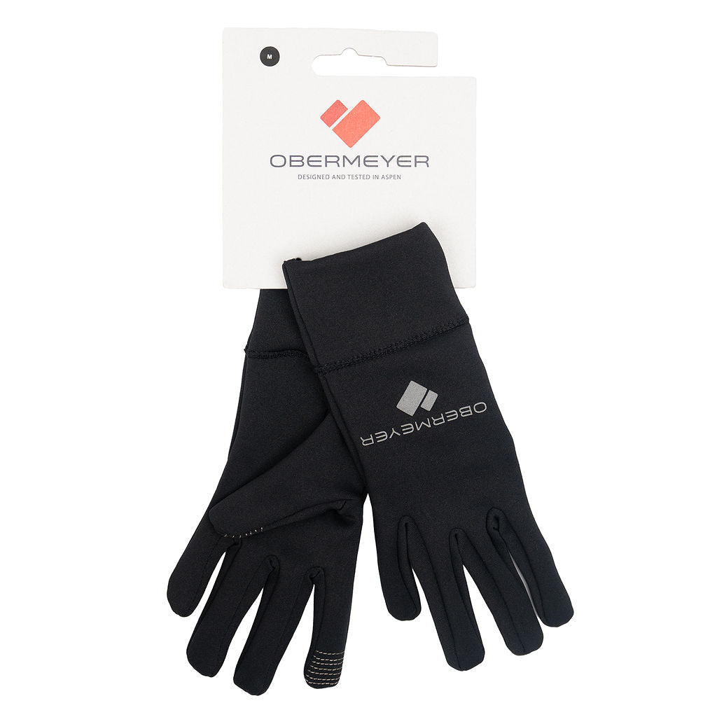 Obermeyer women's black liner gloves size M - label and detail view